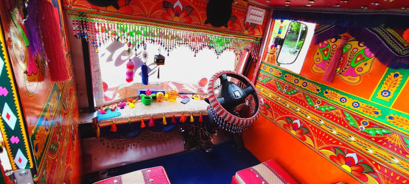 Pakistani artist promotes Truck Art & EVs